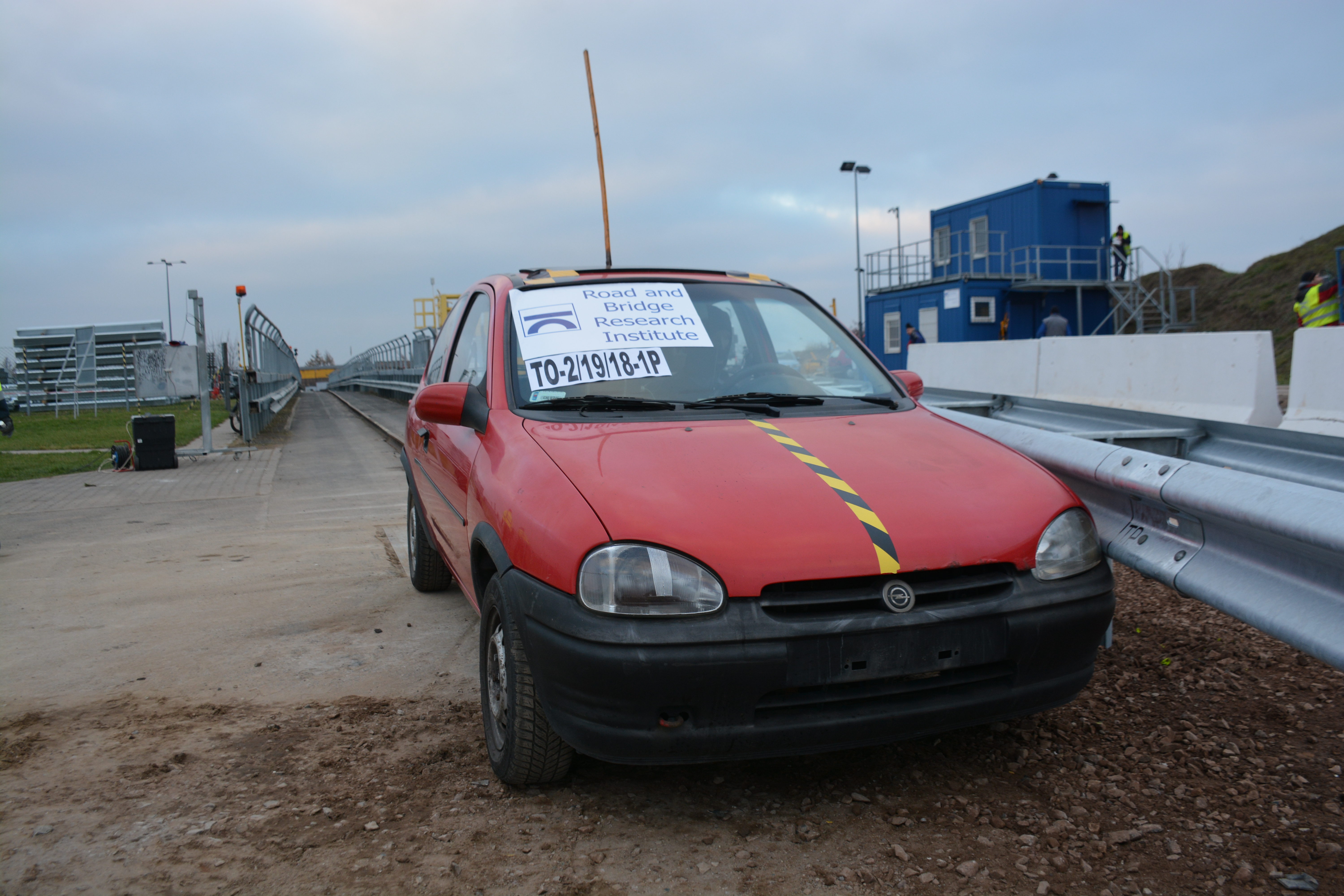 Fig. 1 Protective barrier and test vehicle prior to the first crash test